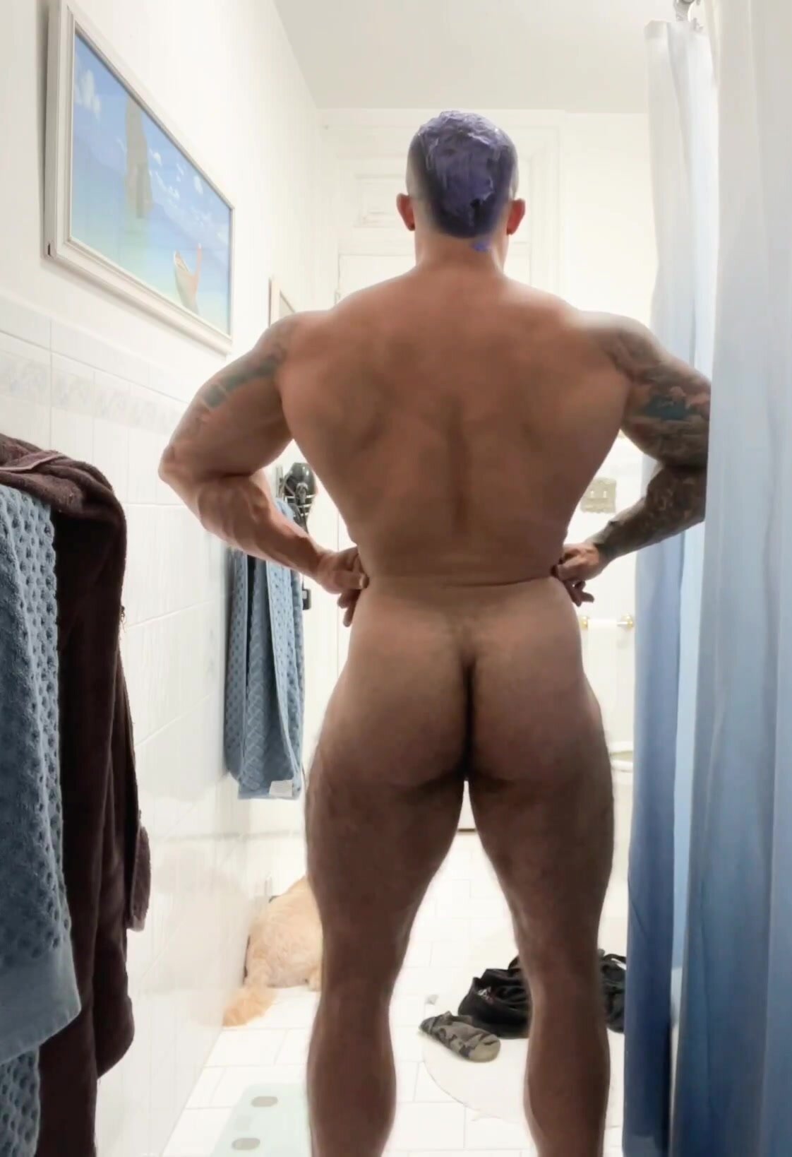 Dominican muscle flexing naked