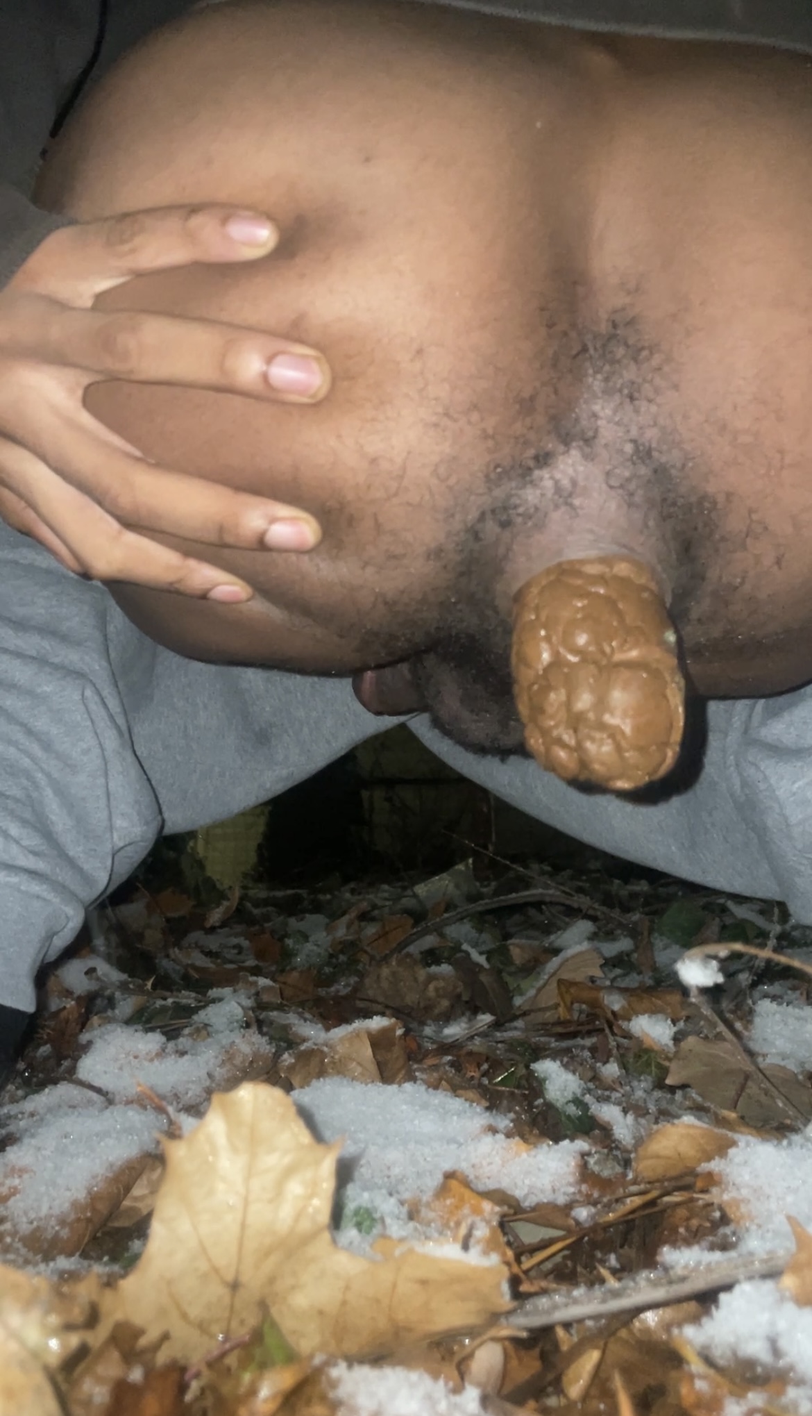 Round ass boy shitting outdoor