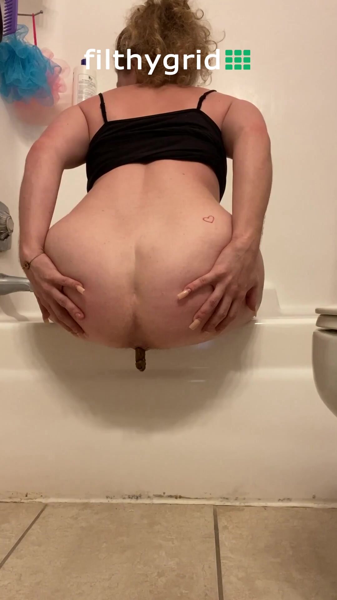 Taking A Shit Off The Side Of The Tub