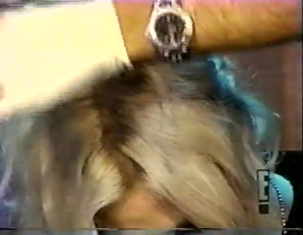 Howard Stern cuts womans hair