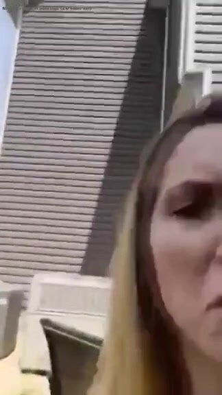 crazy bitch shits in her front yard in public view