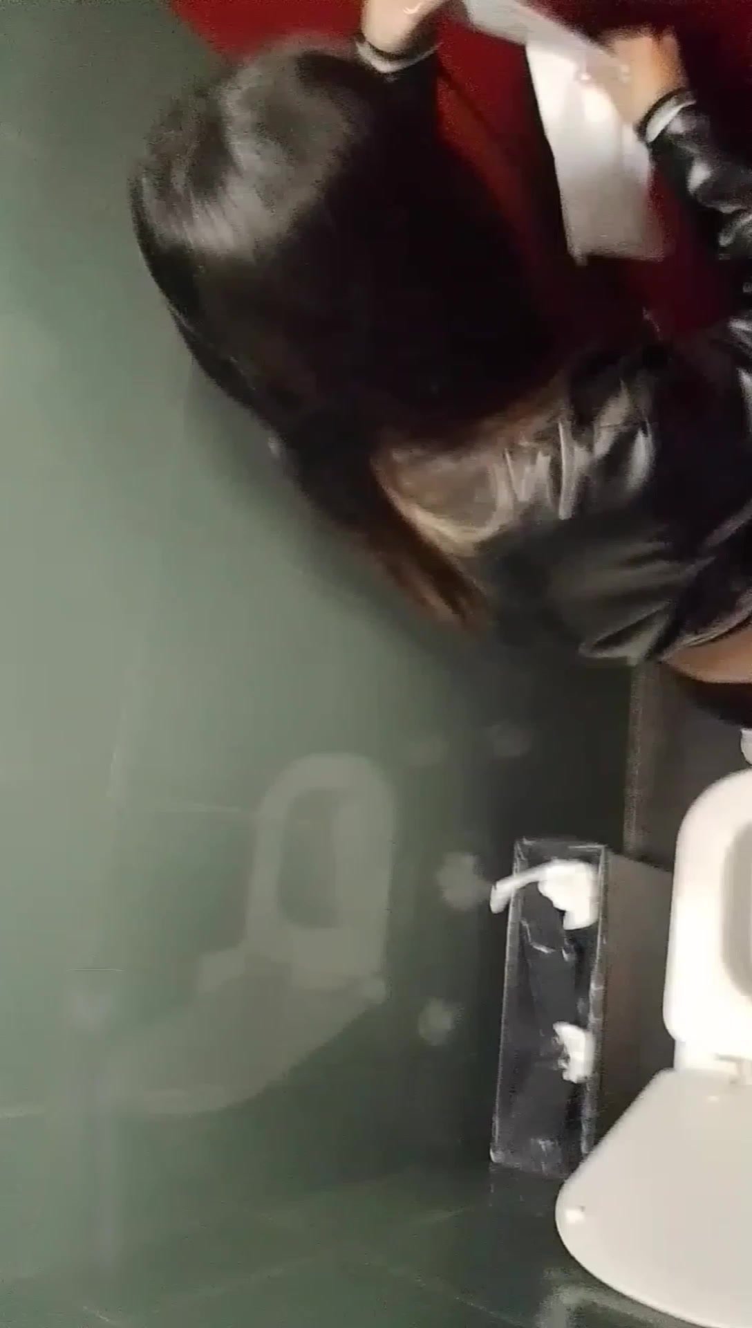 sweet girl cleaning herself in public bathroom