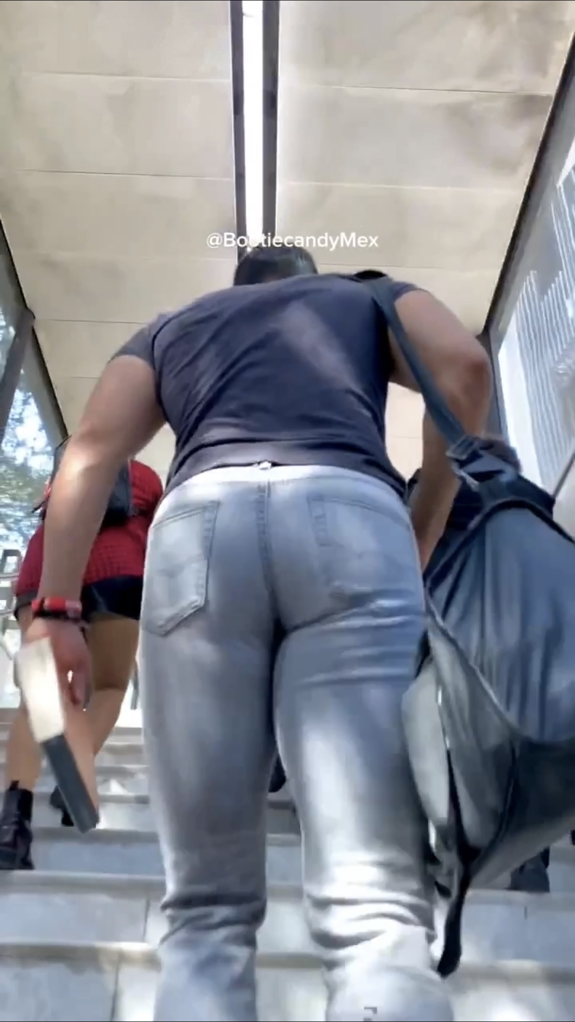 Juicy latino tight jeans booty walking up subway stairs