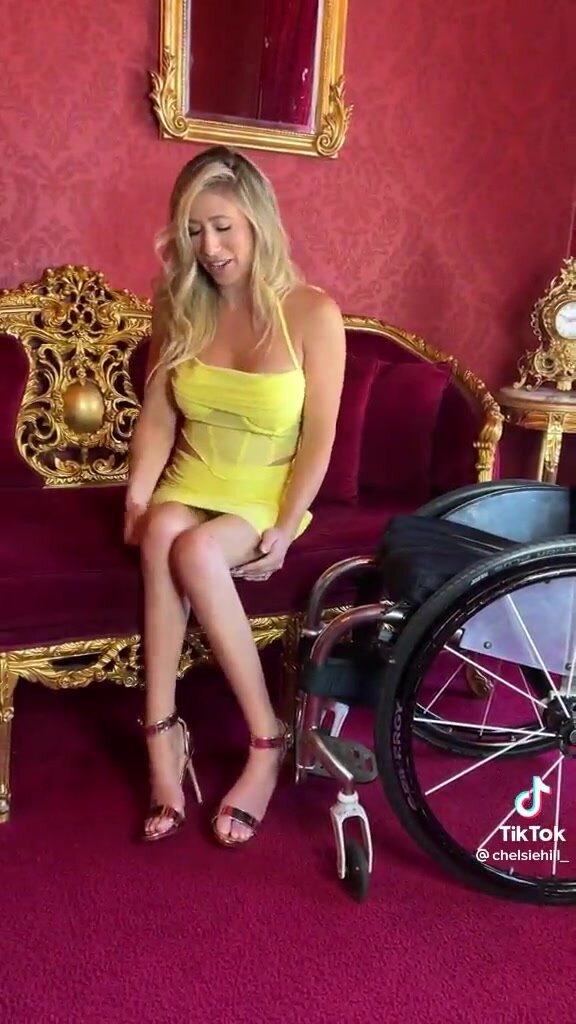 Paraplegic Chelsie adjusting her legs