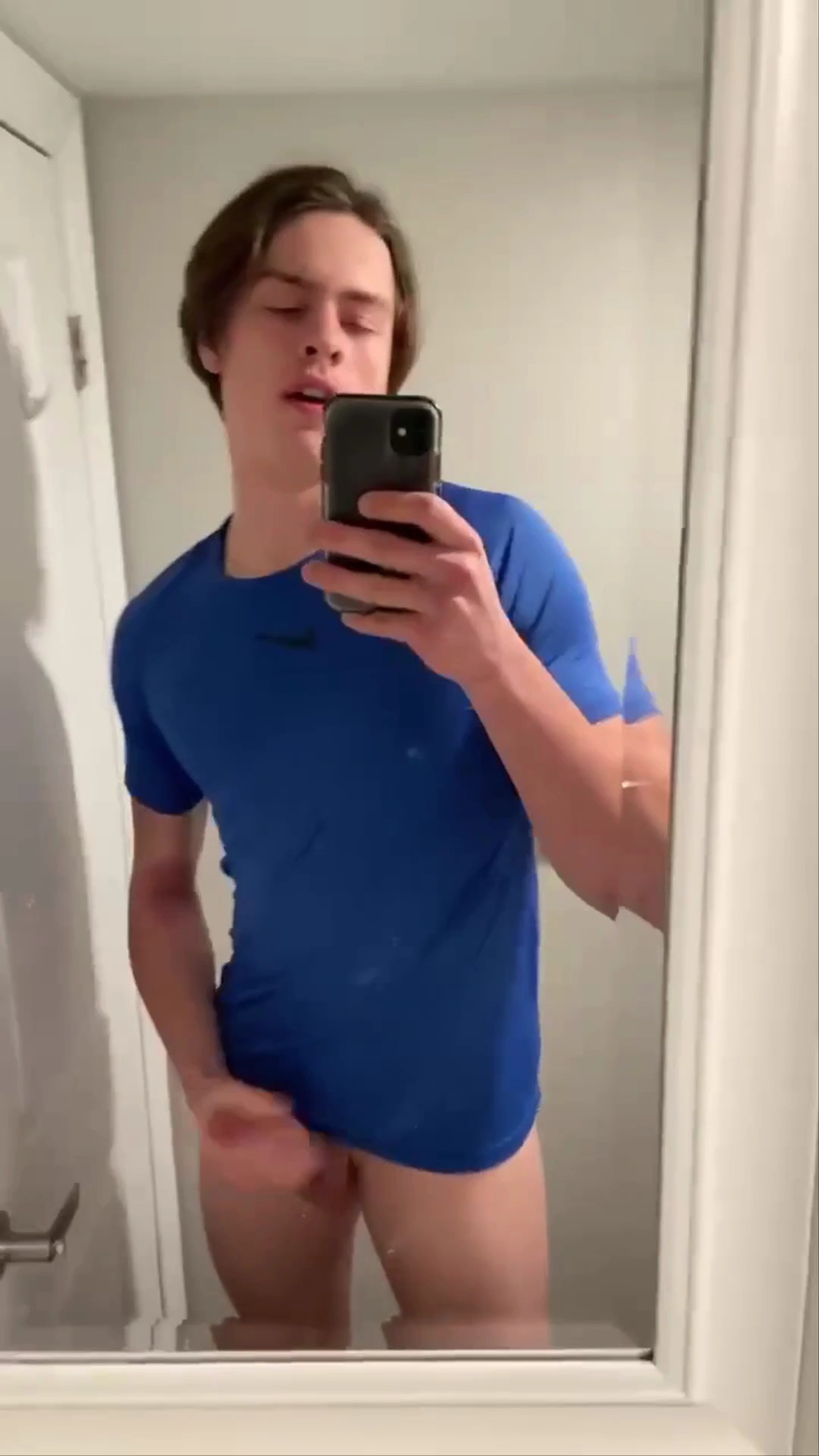 Baited hot longhaired guy jerkoff on toilet