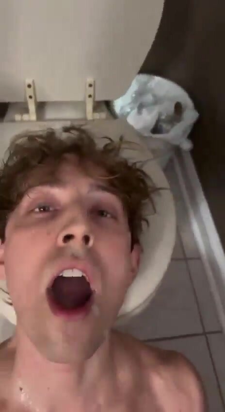 Cute twink sub receives piss at public toilet