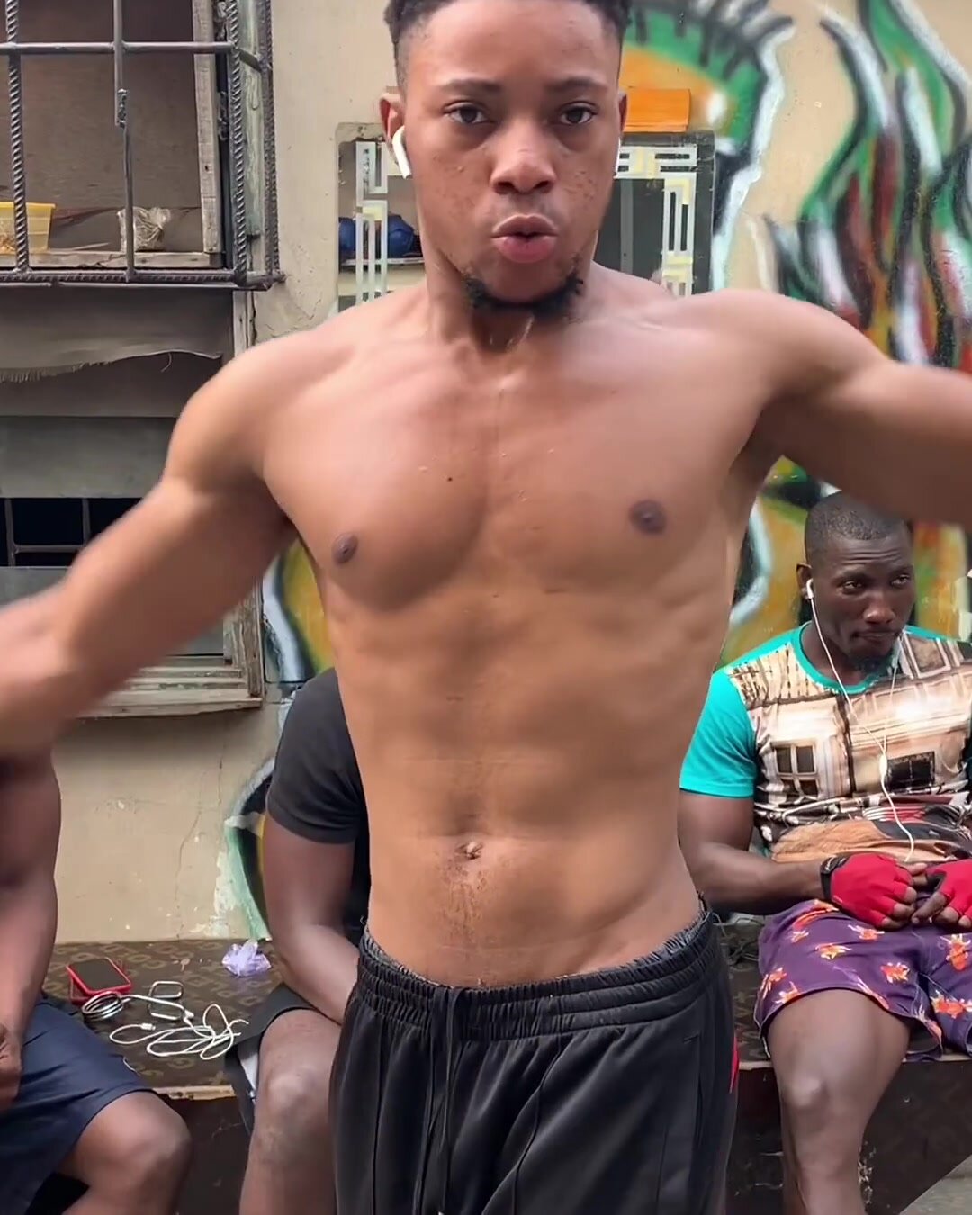 Teen Black African posing muscles