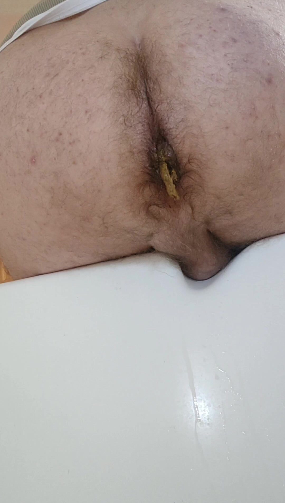 Poop in the bathtub at a friend's house