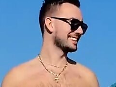 Handsome guy naked at the beach - video 2