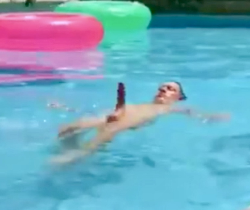 Dick poking out of the pool