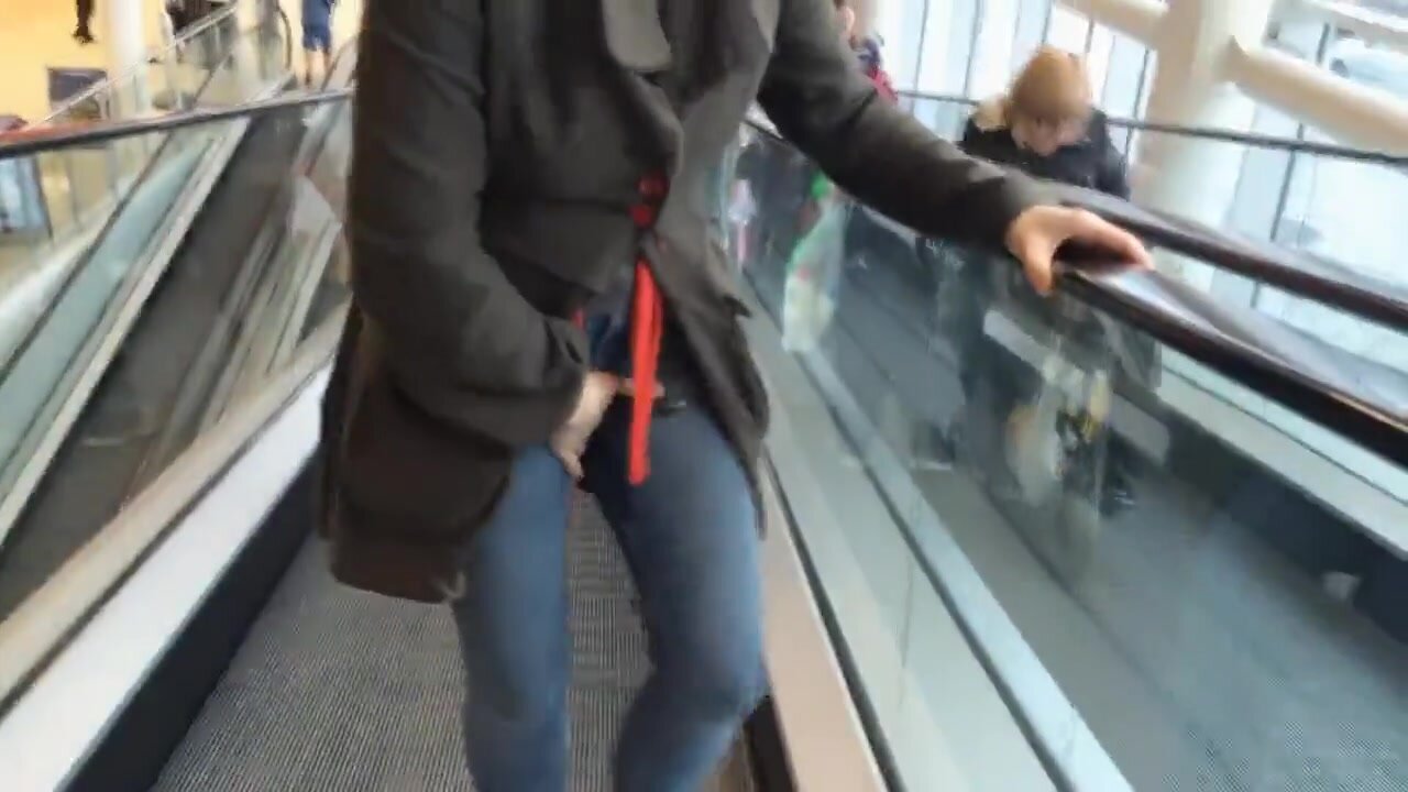 Woman wets pants on escalator