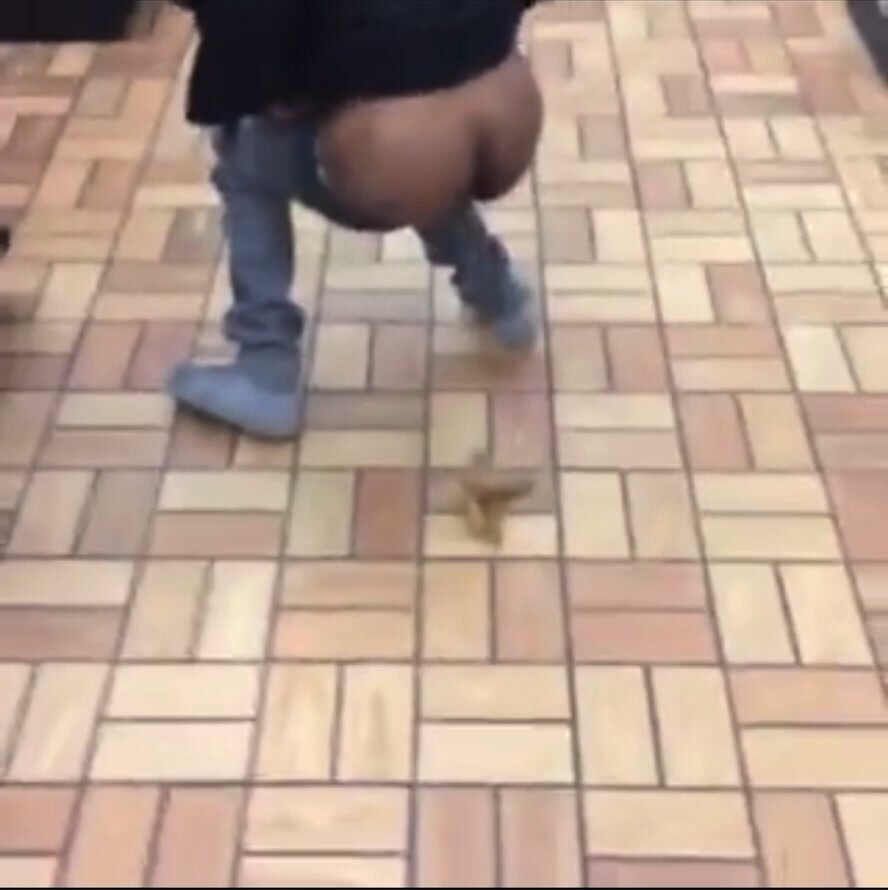 black guy shitting on the floor at local supermarket