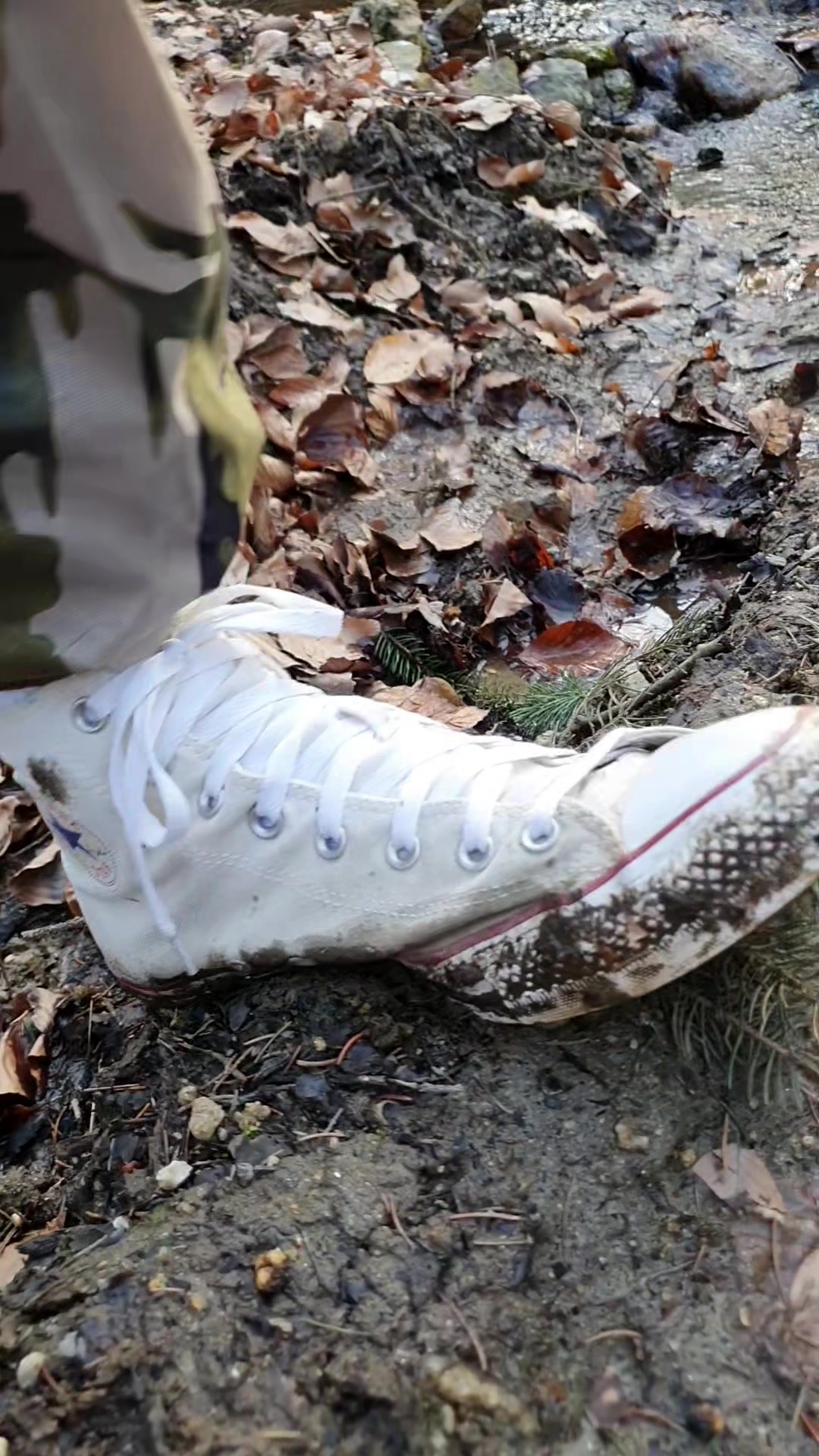 Muddy hike in white Converse with pissing