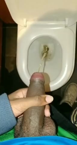YOUNG BLACK BOY SHOWING AND PISSING