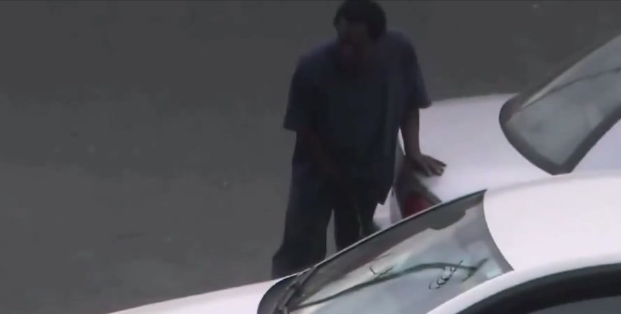 Black guy caught pissing in public - video 3
