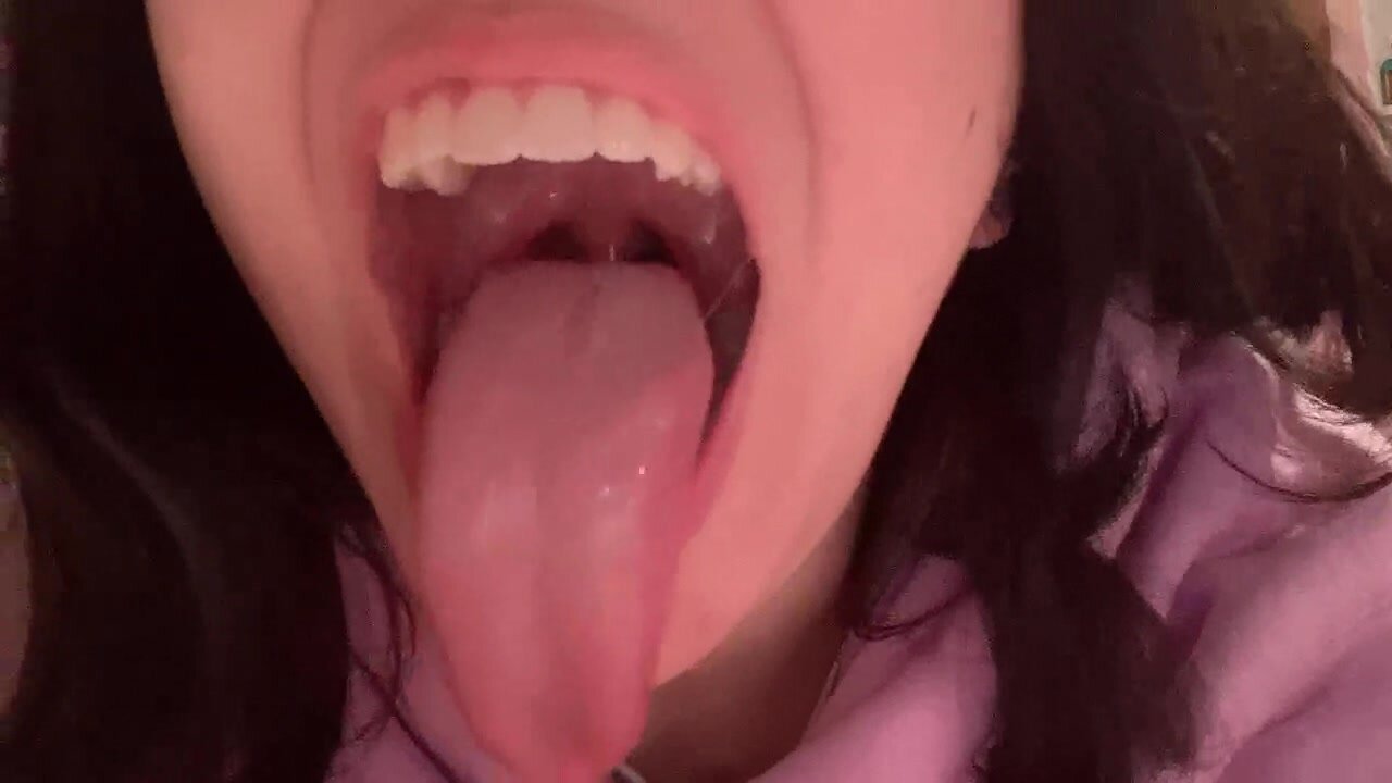 Cute girl shows off Throat