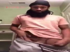 sexy hung bearded black dude busting a nut