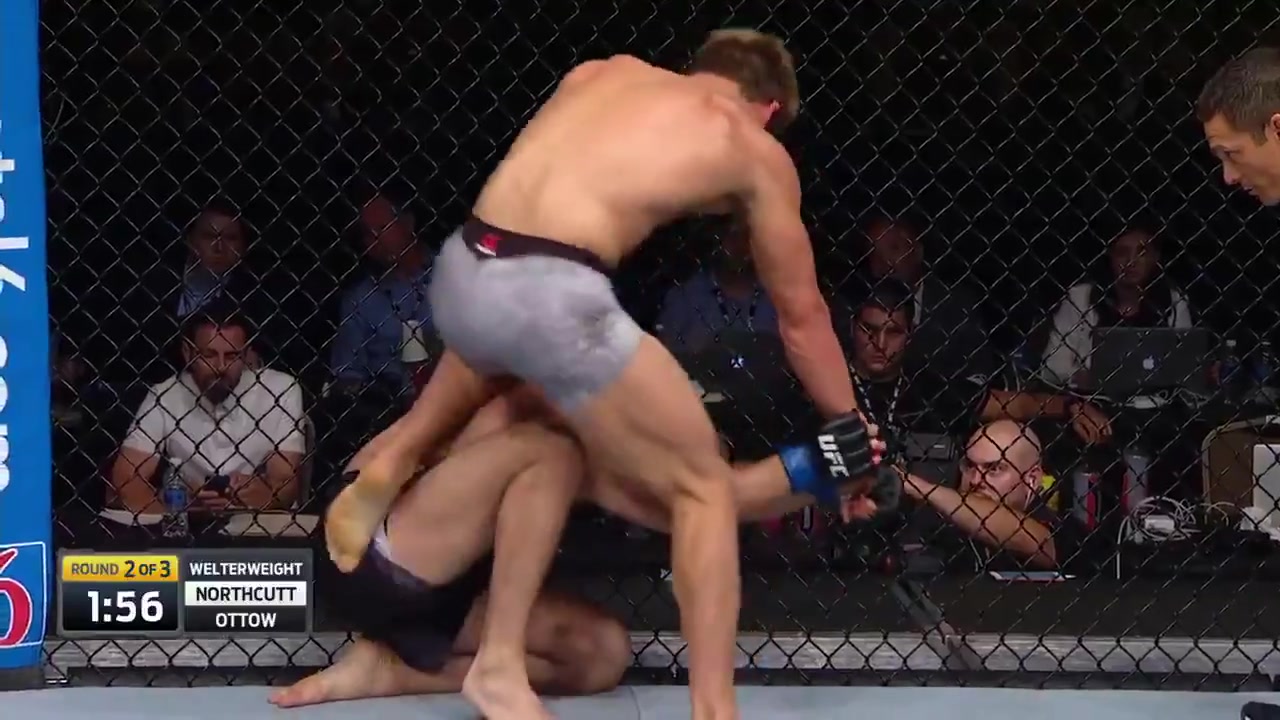 MMA Fighter Uses His Foot To Pry Opponents Hand Off Of Him