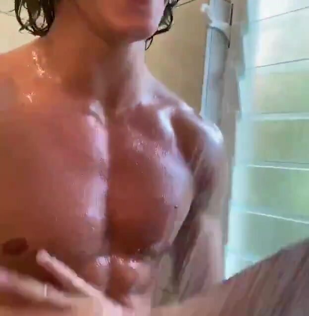 Two friends admire their bodies and cocks in the shower