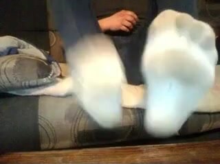 Straight man in smelly white socks