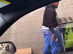 Black guy caught pissing on the street
