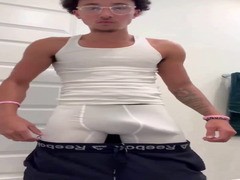 sexy light-skinned dude showing off his hard bulge