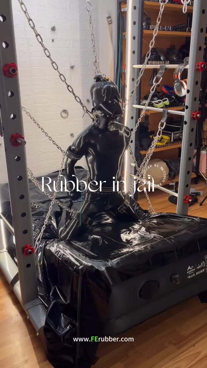 rubber slave in dark jail whole day