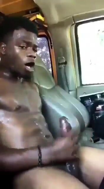 Young black stud having a quick nut in car