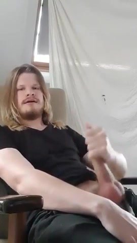 Long haired Scandinavian wanks his uncut cock and cums