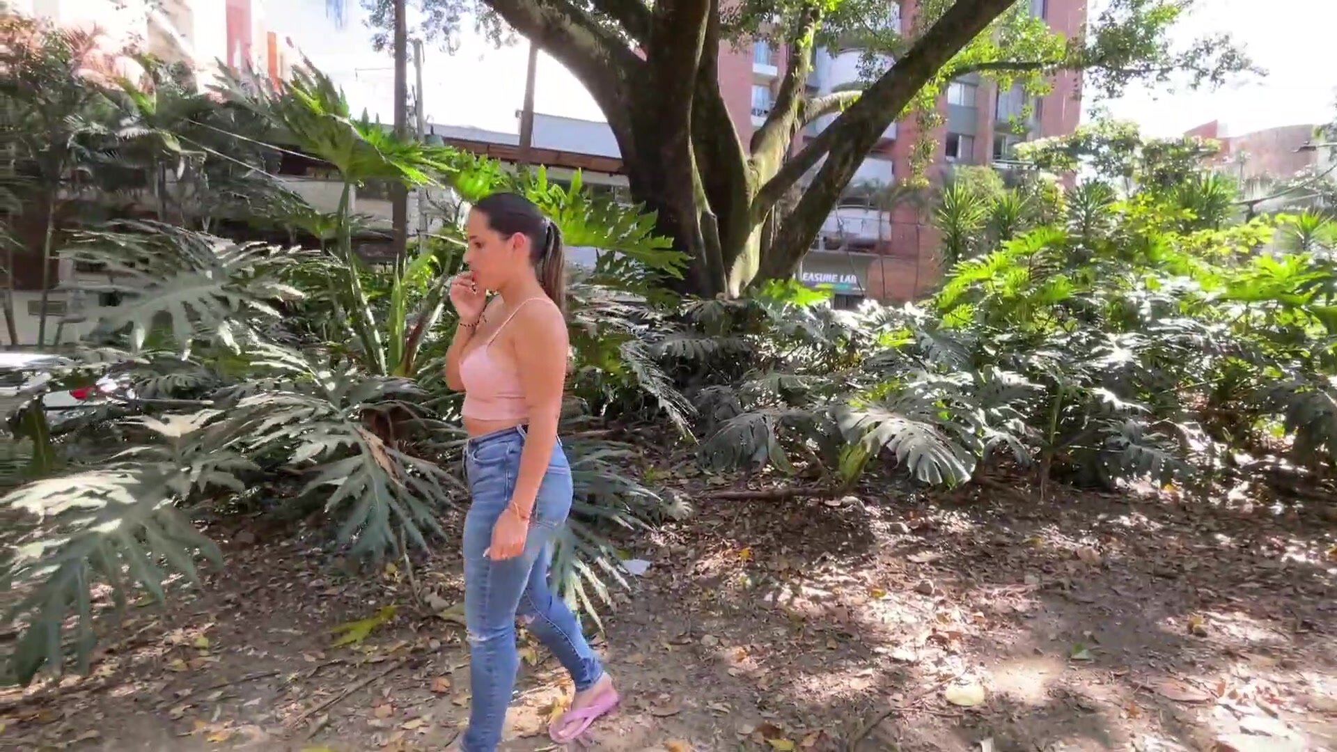 She pees in her jeans in a park