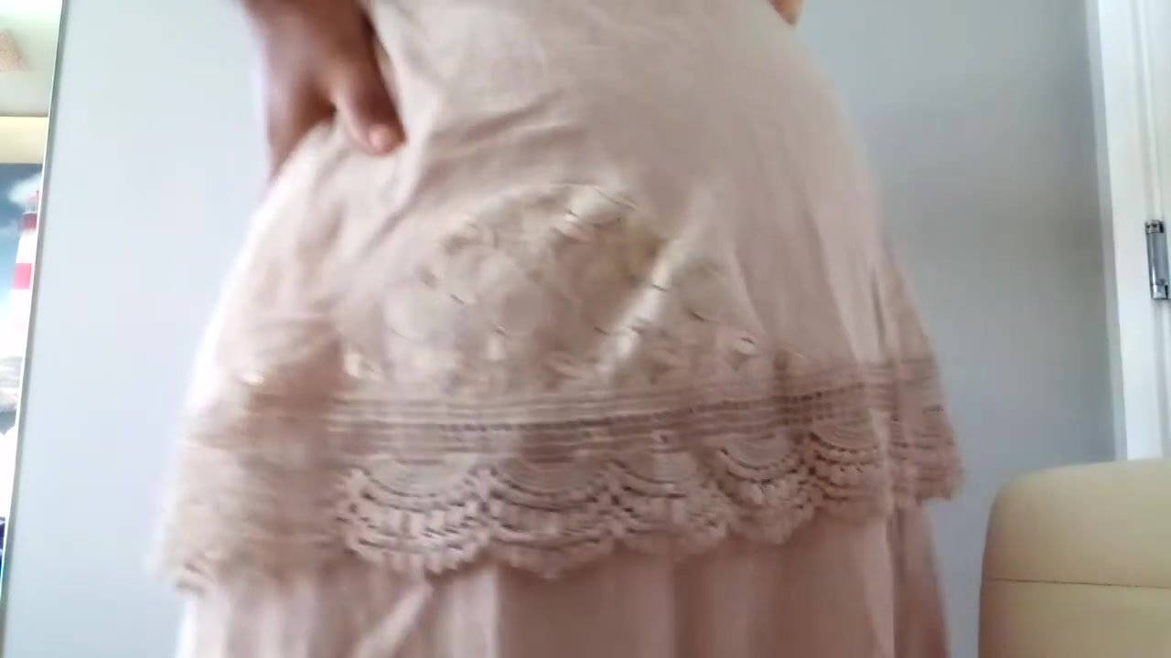 pregnant bellyache in white dress