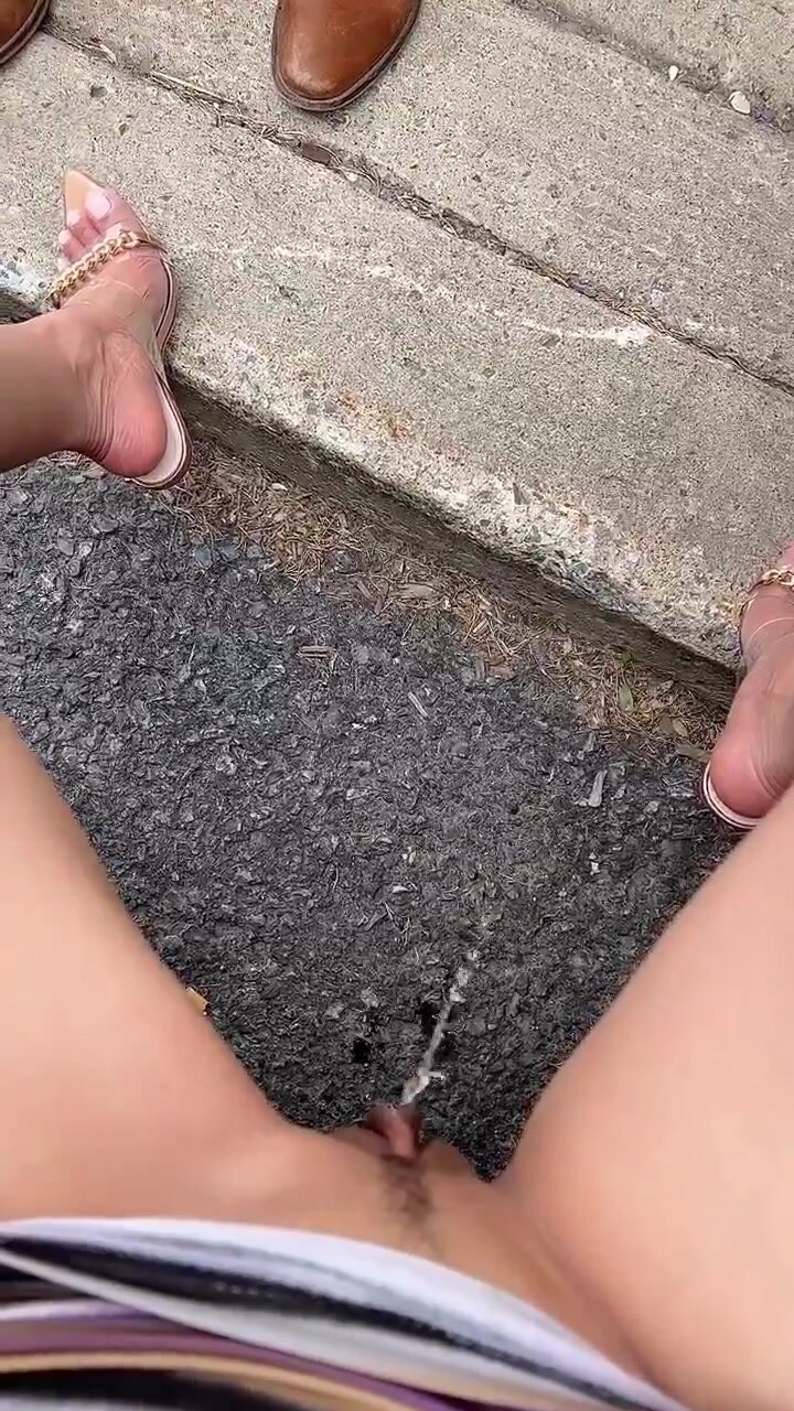 Cute foot gf films her POV peeing out of the car