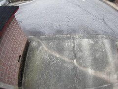 Guy pisses and leaves huge puddle behind alley