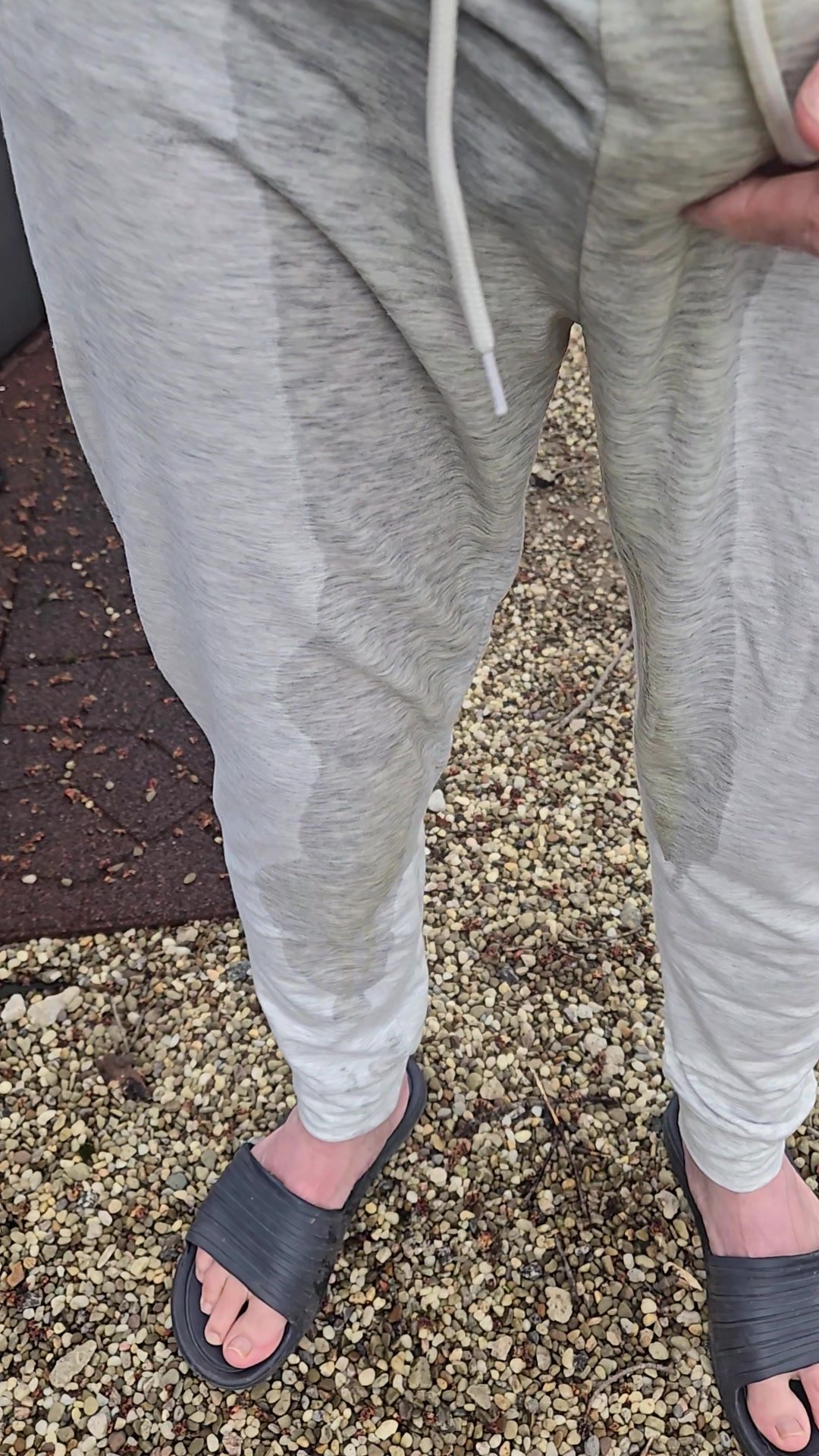 Grey pants wetting outside