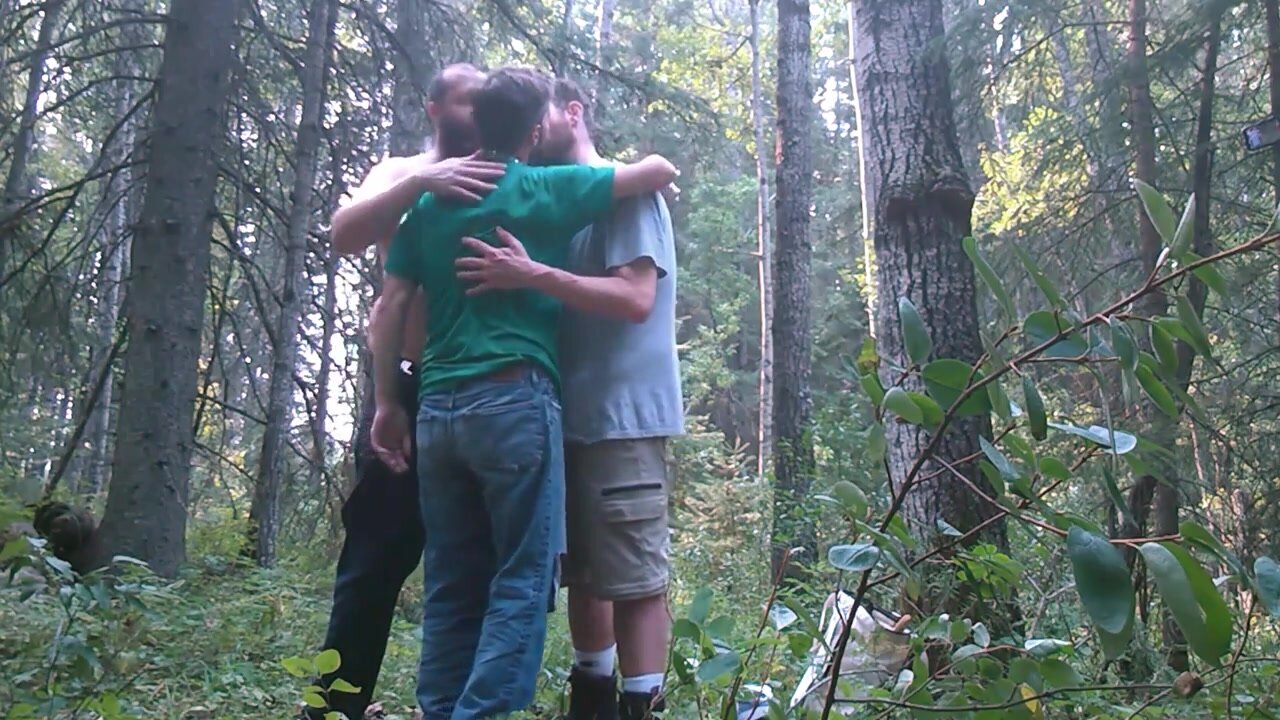Three guys kissing