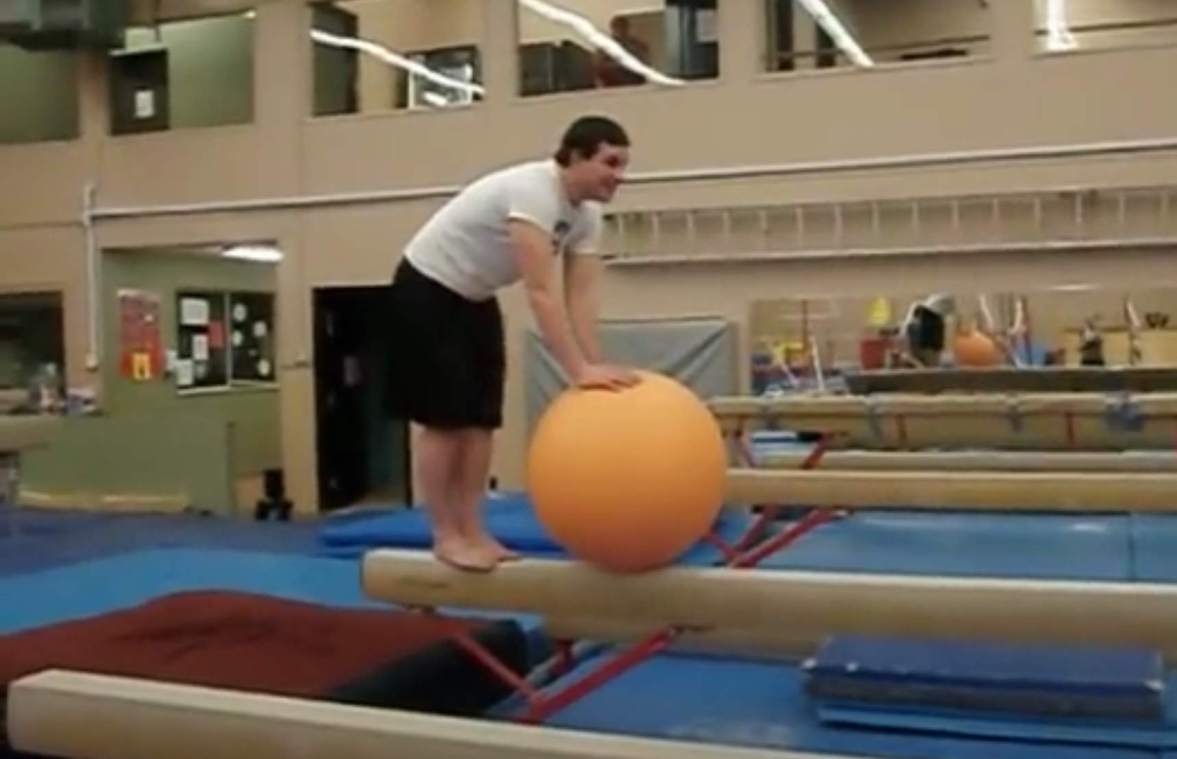 Barefoot gymnast crushes balls