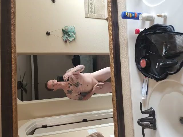 Str8 american dad shows off infront of mirror