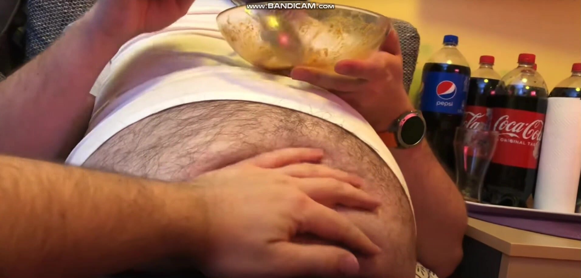 beer gut hairy gainer stuffs belly and gets belly rubs