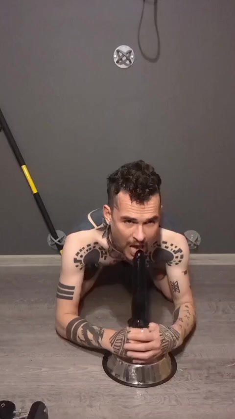 faggot deepthroating a dildo