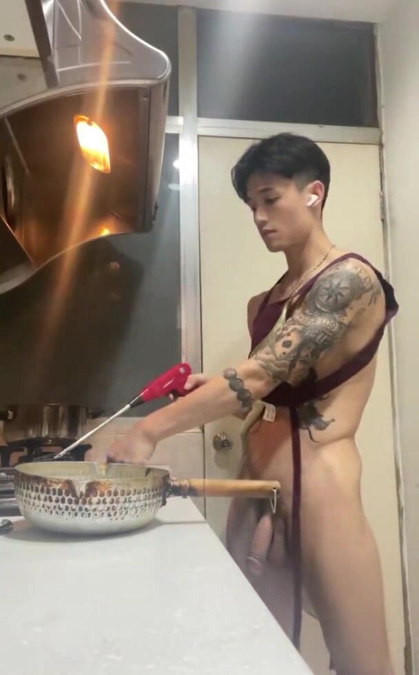 handsome tatoo boy jerking in kitchen