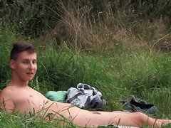 Naked sunbather having a good time
