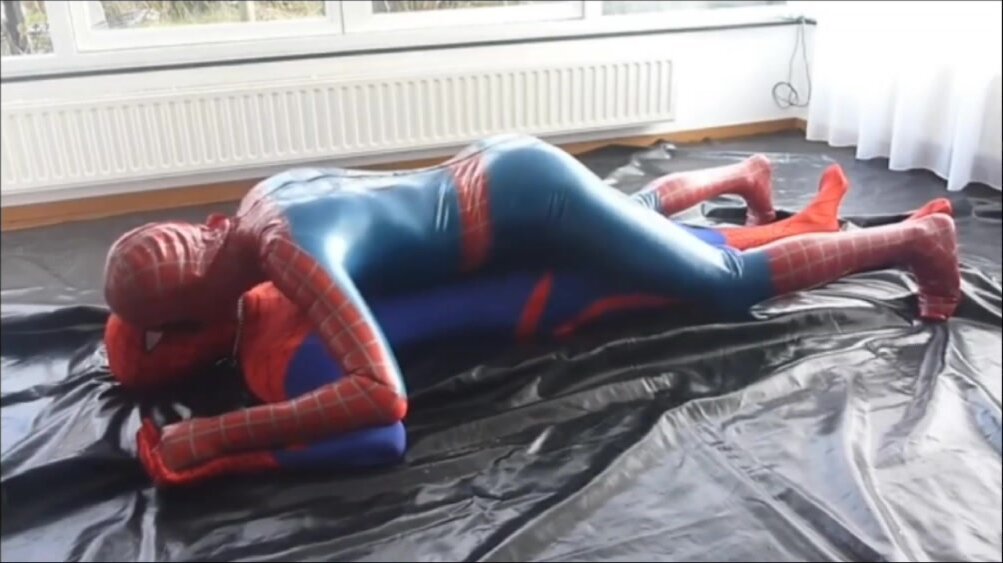 Two spiderman clones meet and rub their bulges