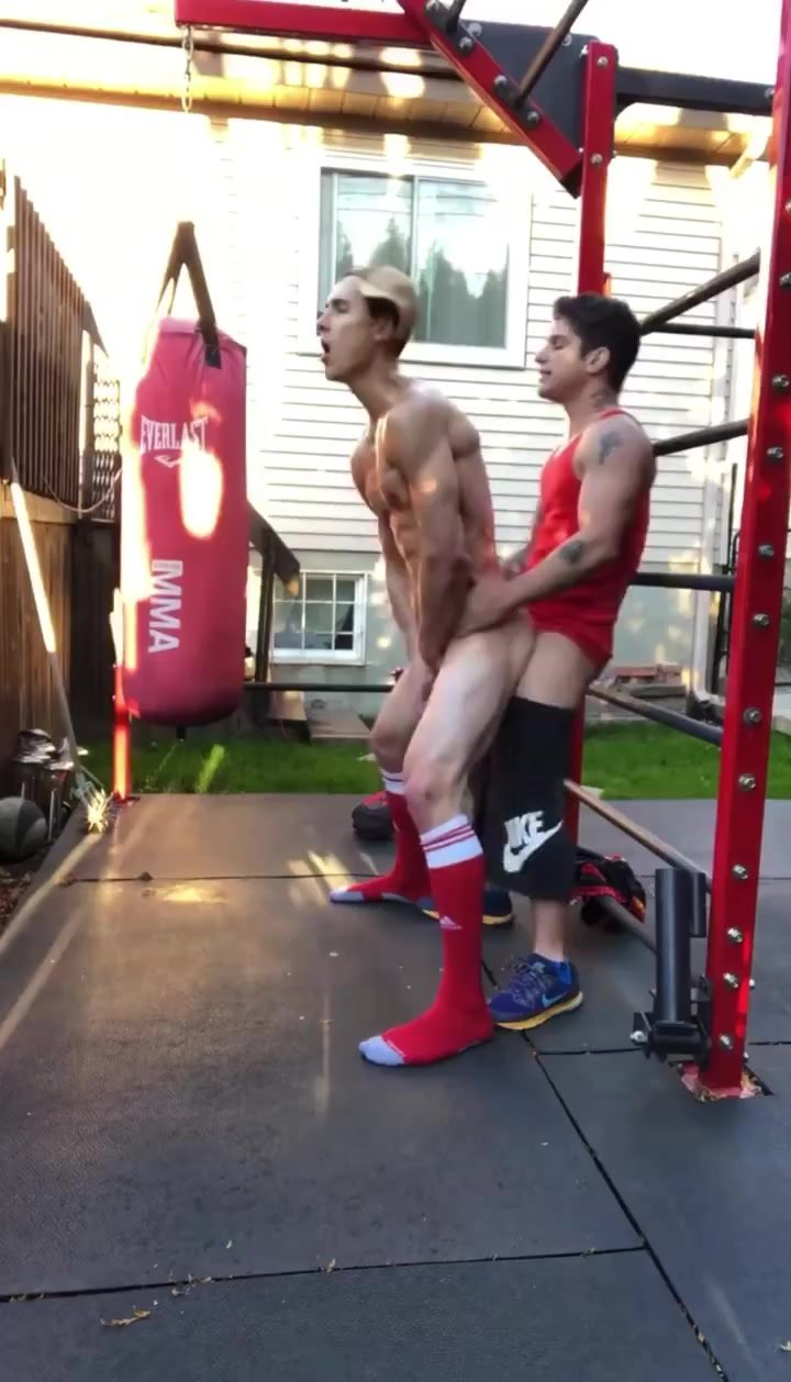 two guys fuck in a boxing gym