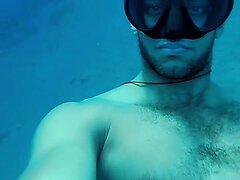 Arab hottie snorkeling masked underwater