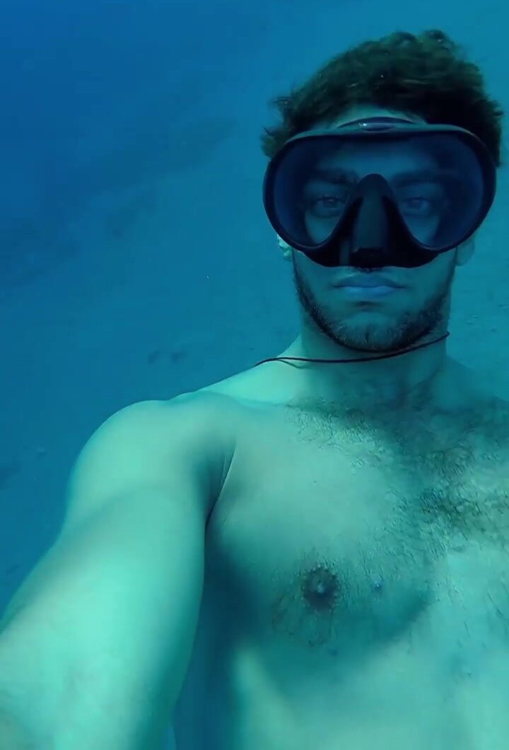 Arab hottie snorkeling masked underwater