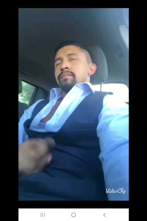 Suited jerking off in the car