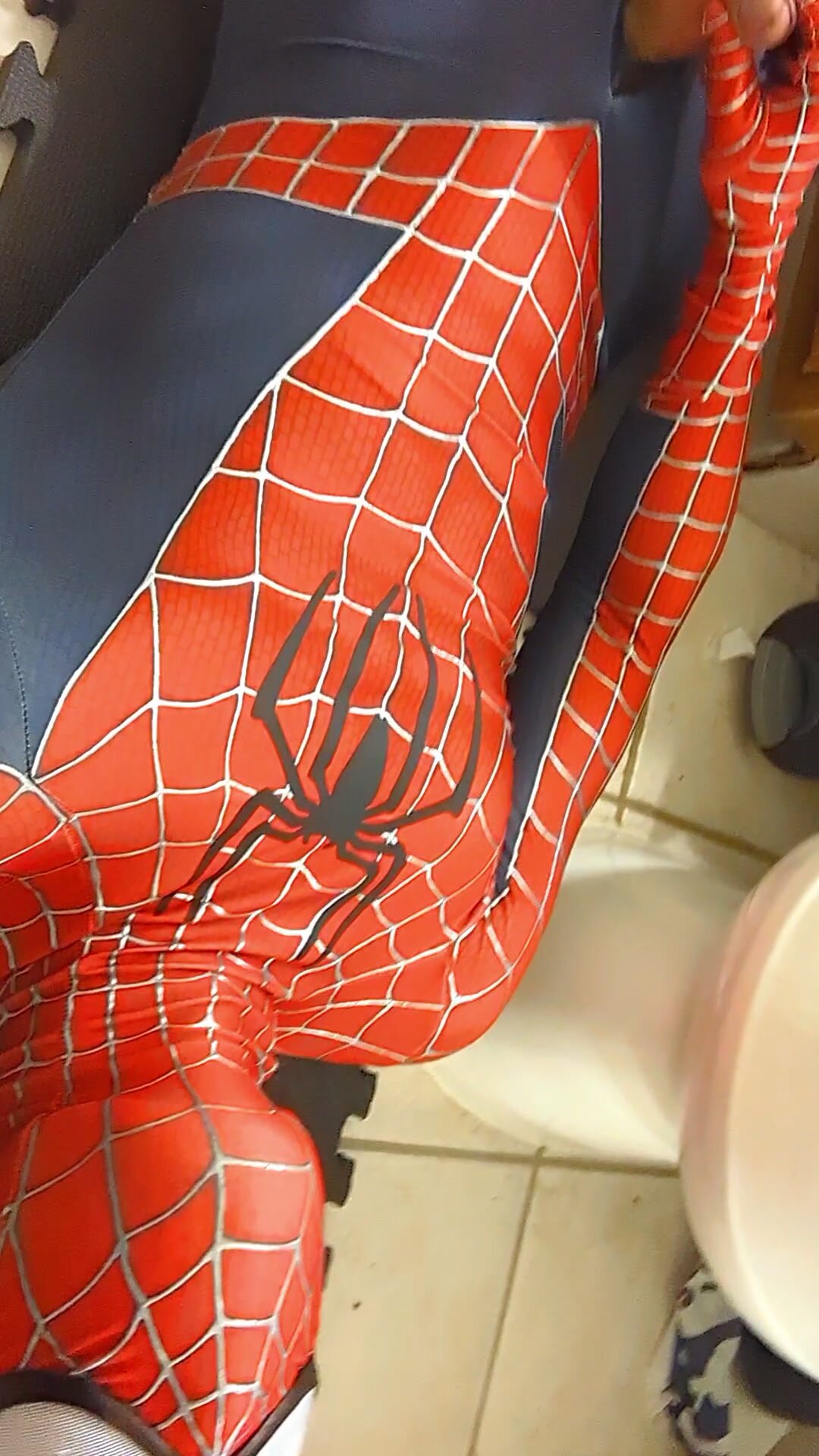 spiderman cums lying down next to toilet