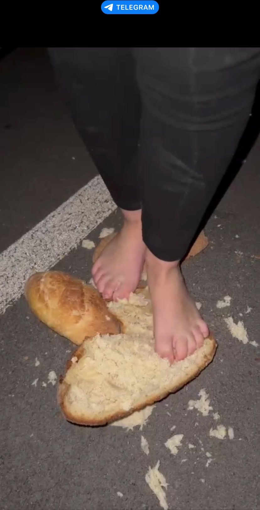 Girl trample and crush bread