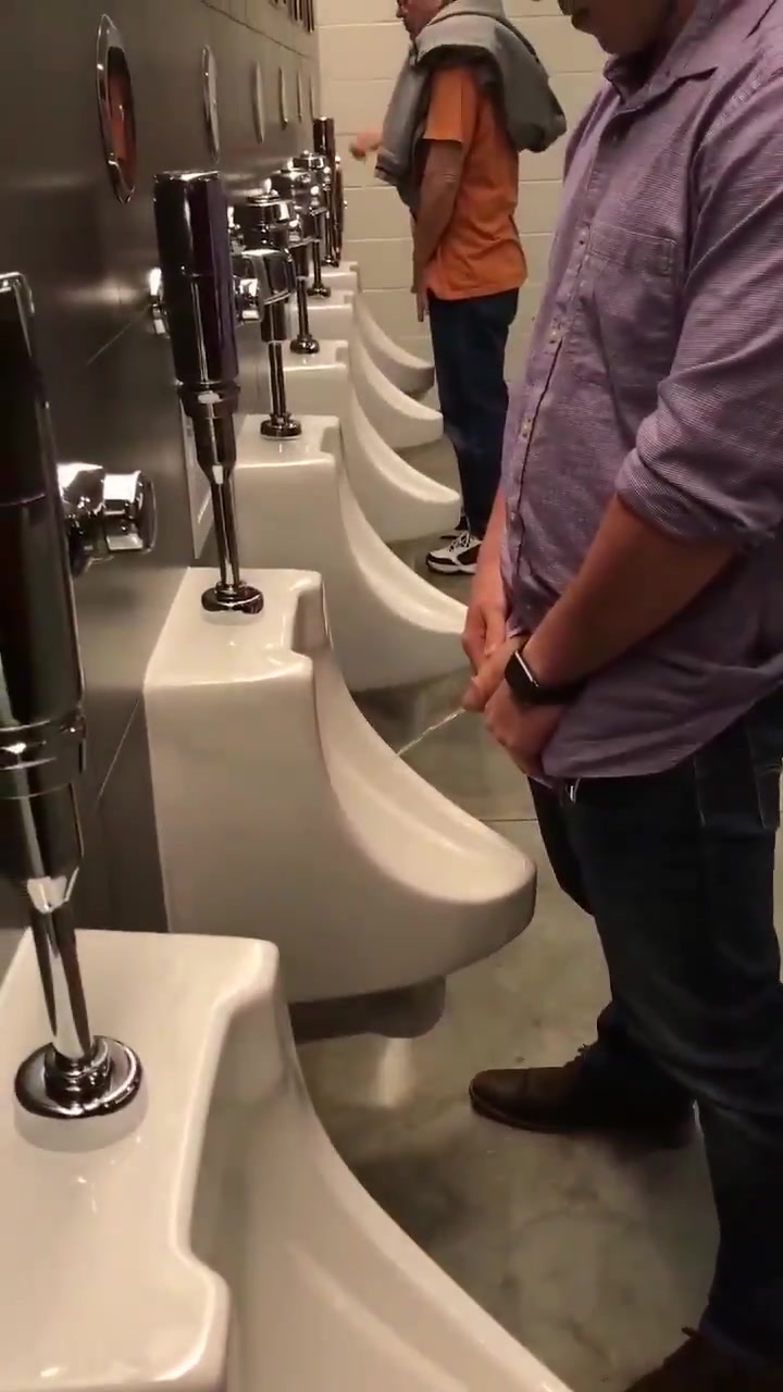 hot boy peeing at the urinal 34