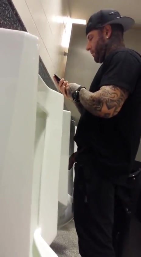 Tatted dude with a big cock piss